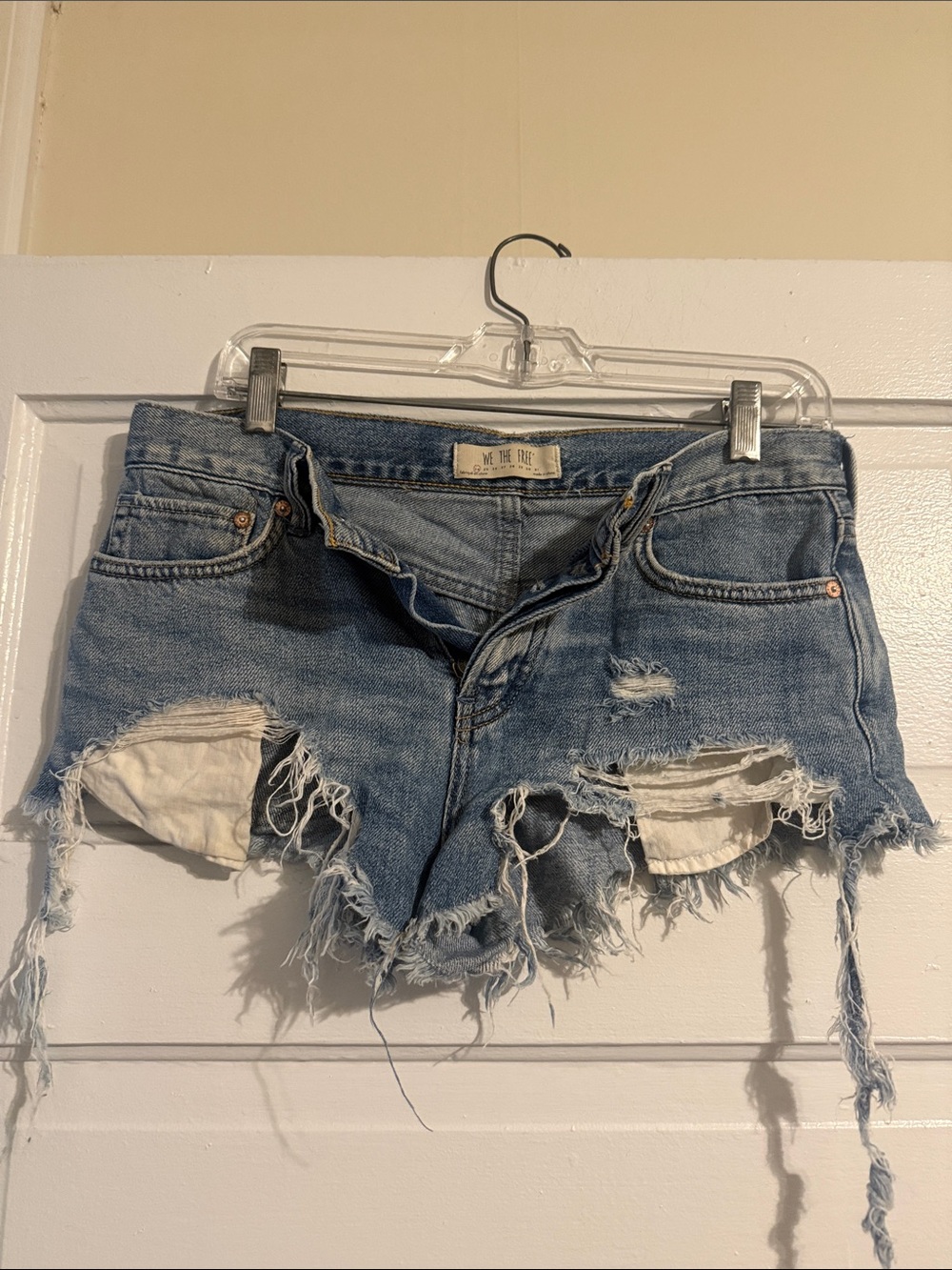 We The Free light blue distressed denim shorts